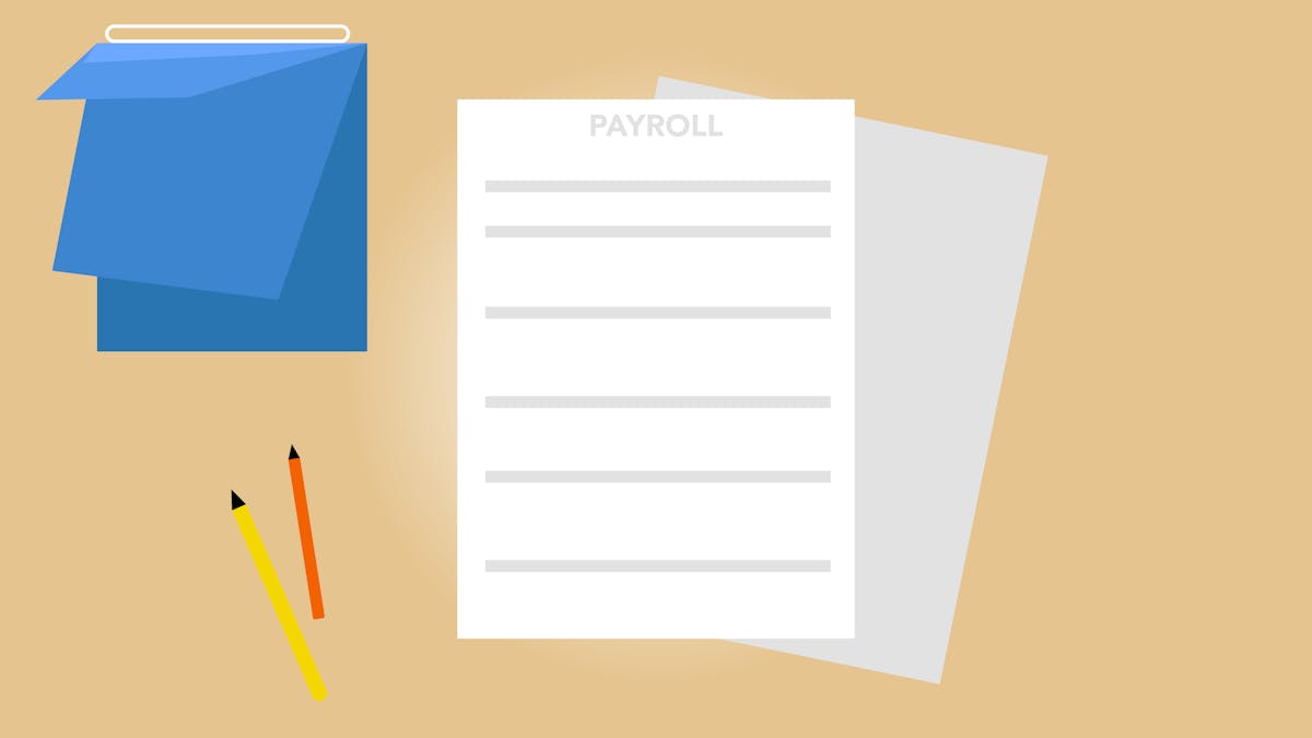 Documents de paie disposés sur un bureau avec crayon et carnet